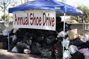 NO SHOELESS PERSON IN THE WORLD! BENEFIT THOSE IN NEED